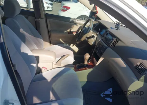 2004 Toyota Corolla Le z USA, uszkodzony, nr VIN JTDBR32EX42044932